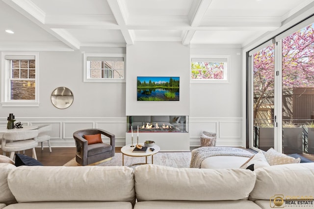 816 W Lill Ave, Chicago, IL 60614 - living area with beamed ceiling, crown molding, wood finished floors, coffered ceiling, and a wainscoted wall