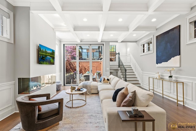 816 W Lill Ave, Chicago, IL 60614 - living room featuring beam ceiling, coffered ceiling, wood finished floors, recessed lighting, and a decorative wall