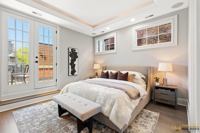 816 W Lill Ave, Chicago, IL 60614 - bedroom featuring access to exterior, wood finished floors, recessed lighting, a raised ceiling, and baseboards