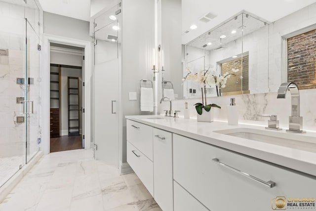 816 W Lill Ave, Chicago, IL 60614 - bathroom with a shower stall, recessed lighting, double vanity, and marble finish flooring