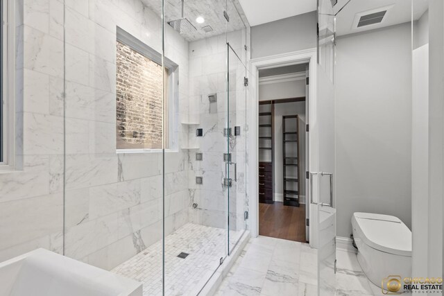816 W Lill Ave, Chicago, IL 60614 - full bath with a shower stall, toilet, marble finish floors, and baseboards
