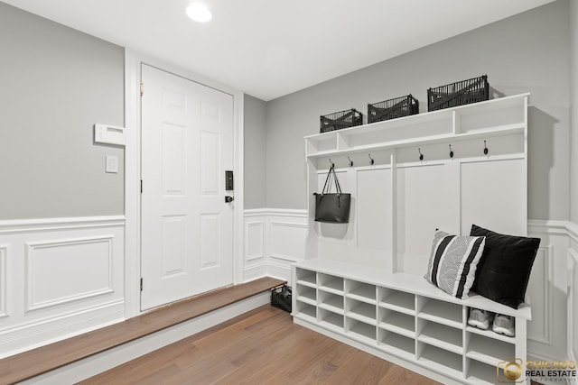 816 W Lill Ave, Chicago, IL 60614 - mudroom with wainscoting, a decorative wall, light wood finished floors, and recessed lighting