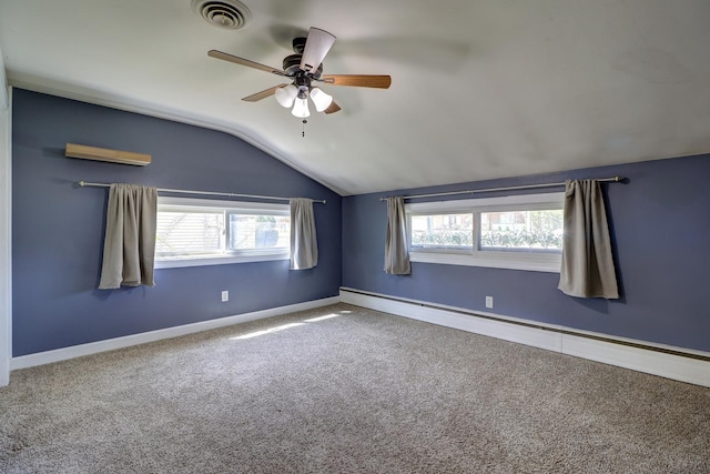 unfurnished room featuring lofted ceiling, carpet, visible vents, a baseboard radiator, and ceiling fan