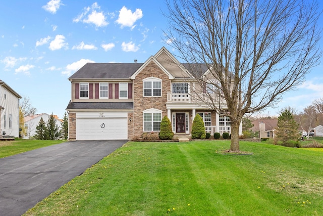 1289 Mallard Ln, Hoffman Estates, IL 60192 - traditional-style home with an attached garage, aphalt driveway, stone siding, and a front lawn