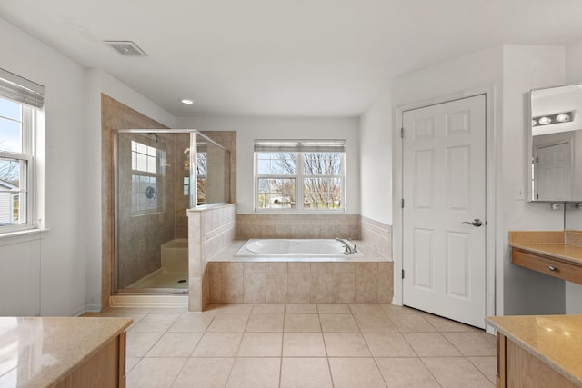 1289 Mallard Ln, Hoffman Estates, IL 60192 - full bath featuring a garden tub, a stall shower, vanity, tile patterned flooring, and visible vents
