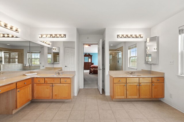 1289 Mallard Ln, Hoffman Estates, IL 60192 - ensuite bathroom with a shower stall, a wealth of natural light, and tile patterned floors