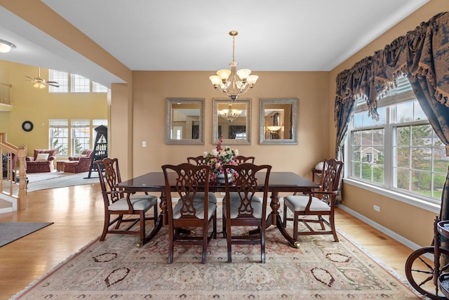 1289 Mallard Ln, Hoffman Estates, IL 60192 - dining space featuring wood finished floors, baseboards, and ceiling fan with notable chandelier