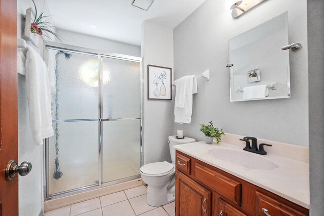 2756 Fox River Ln, Naperville, IL 60565 - bathroom with tile patterned floors, a shower stall, toilet, and vanity