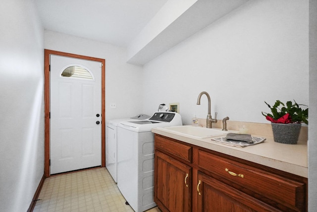 2756 Fox River Ln, Naperville, IL 60565 - clothes washing area featuring independent washer and dryer, a sink, light floors, and baseboards