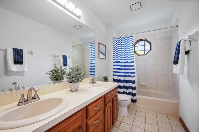 2756 Fox River Ln, Naperville, IL 60565 - full bath with tile patterned flooring, double vanity, shower / bath combo with shower curtain, and toilet
