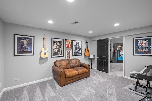 sitting room featuring carpet flooring, recessed lighting, baseboards, and visible vents
