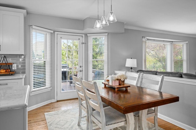 dining area with baseboards and a wealth of natural light