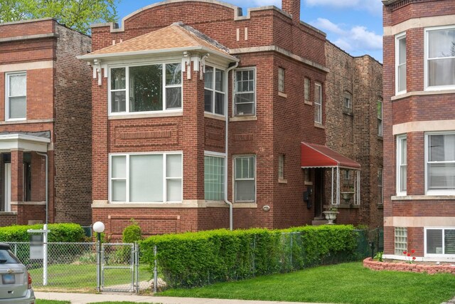 7748 S Saginaw Ave, Chicago, IL 60649 - view of building exterior with fence