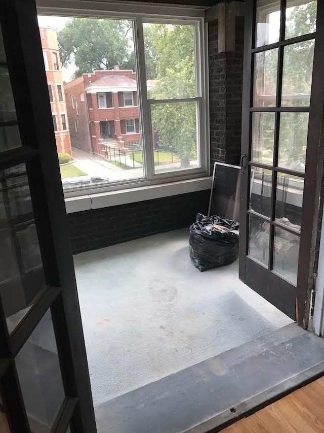 7748 S Saginaw Ave, Chicago, IL 60649 - sunroom / solarium featuring healthy amount of natural light