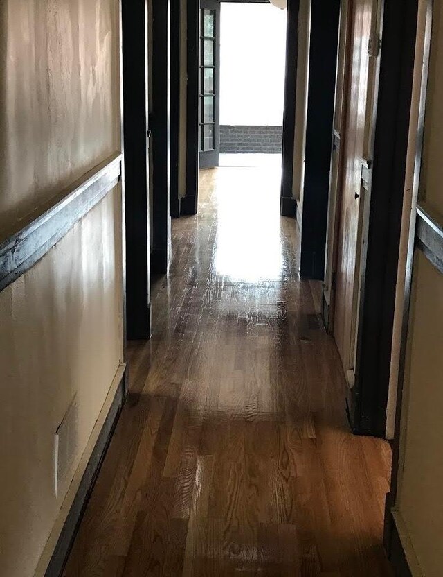 7748 S Saginaw Ave, Chicago, IL 60649 - corridor featuring wood finished floors