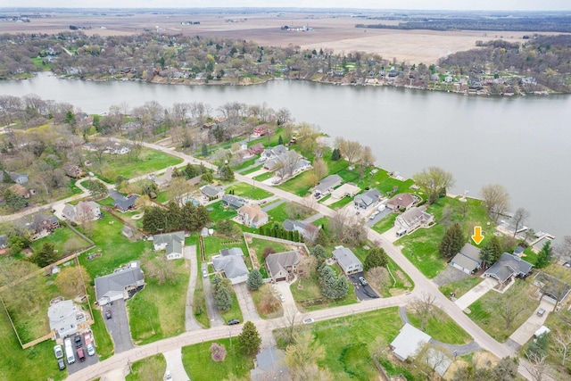 bird's eye view with a residential view and a water view
