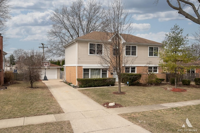 traditional-style home with a detached garage, an outdoor structure, fence, a front lawn, and driveway