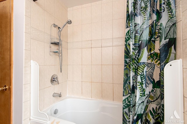 bathroom with shower / bath combination with curtain
