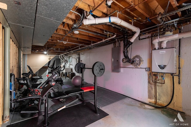 workout room with electric panel and water heater