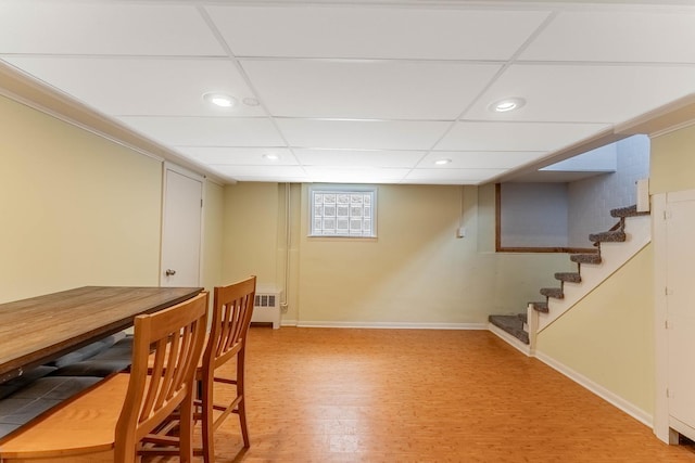 5626 S Nashville Ave, Chicago, IL 60638 - unfurnished dining area with baseboards, light wood finished floors, radiator, recessed lighting, and stairs