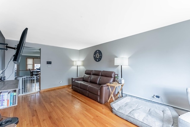 5626 S Nashville Ave, Chicago, IL 60638 - living room with baseboards and light wood-style floors