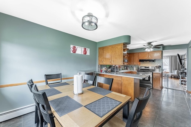 5626 S Nashville Ave, Chicago, IL 60638 - dining area with a baseboard radiator, baseboards, and ceiling fan