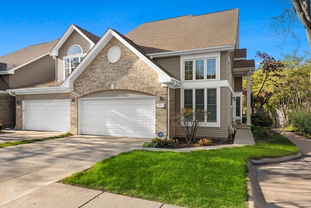 traditional-style house with driveway, brick siding, an attached garage, and roof with shingles