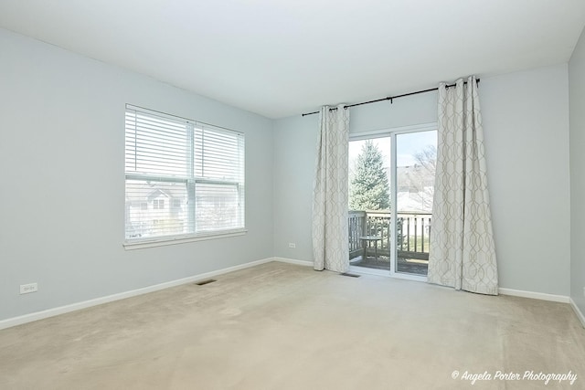 1244 Chesterton Dr Unit 1244, Fox Lake, IL 60020 - carpeted empty room with baseboards and visible vents
