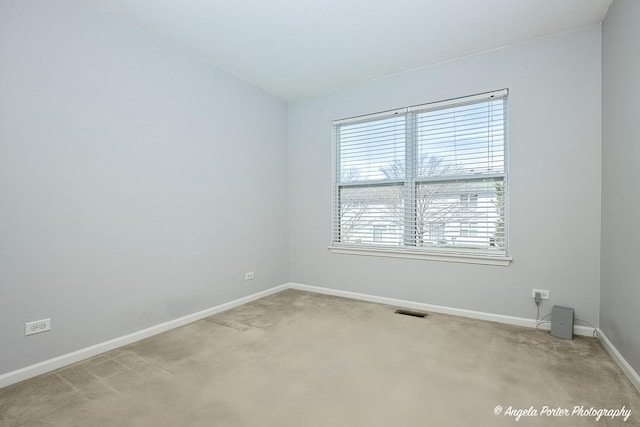 1244 Chesterton Dr Unit 1244, Fox Lake, IL 60020 - empty room featuring visible vents, baseboards, and light carpet