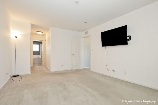 1244 Chesterton Dr Unit 1244, Fox Lake, IL 60020 - unfurnished living room featuring visible vents, baseboards, and light carpet