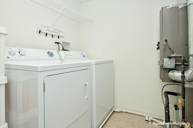 1244 Chesterton Dr Unit 1244, Fox Lake, IL 60020 - laundry room with baseboards, washer and clothes dryer, and laundry area