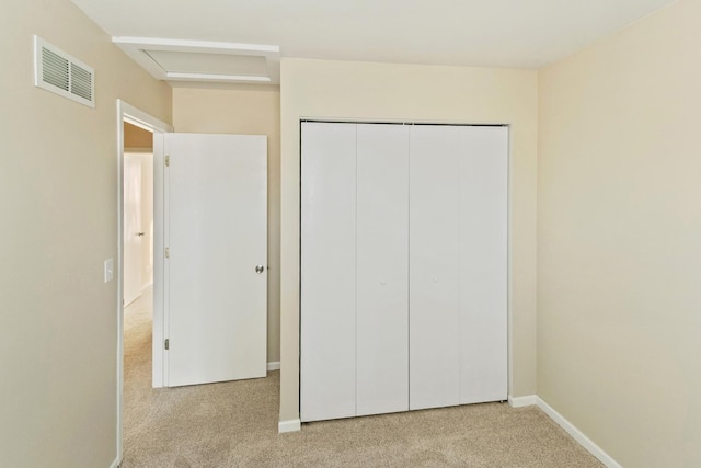 924 Symphony Dr Unit 7036, Aurora, IL 60504 - unfurnished bedroom with carpet, visible vents, a closet, baseboards, and attic access