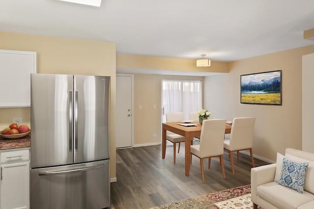 924 Symphony Dr Unit 7036, Aurora, IL 60504 - dining area featuring baseboards and dark wood-style floors