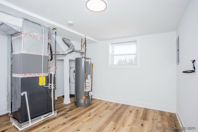 utility room with water heater and heating unit