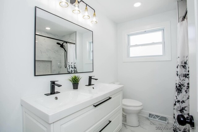 full bathroom with a sink, marble finish floor, baseboards, toilet, and visible vents