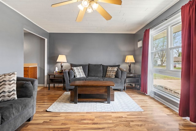 26 S Victoria Ln, Streamwood, IL 60107 - living room featuring ornamental molding, baseboards, wood finished floors, and ceiling fan