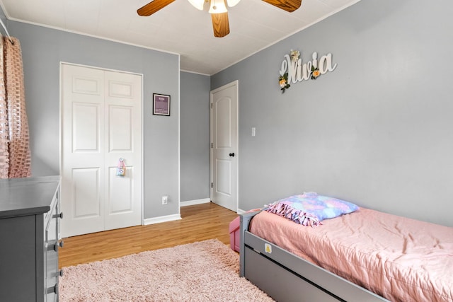 26 S Victoria Ln, Streamwood, IL 60107 - bedroom with ceiling fan, baseboards, crown molding, and light wood finished floors