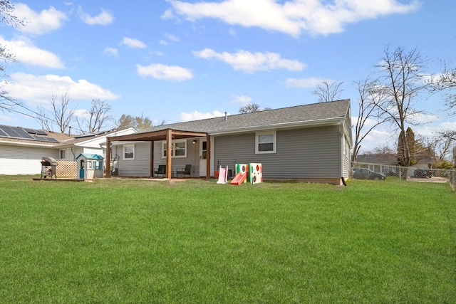26 S Victoria Ln, Streamwood, IL 60107 - rear view of property with a yard, a patio area, and fence