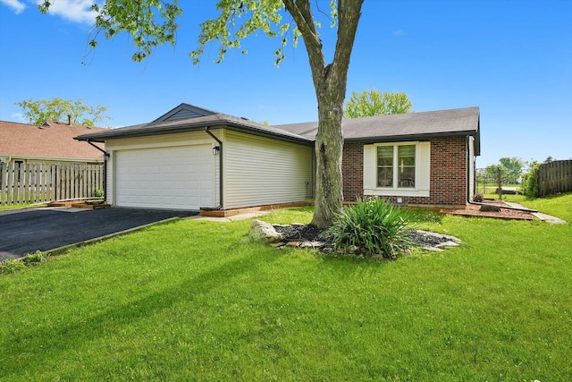1 Fernwood Ct, Romeoville, IL 60446 - ranch-style house with a garage, asphalt driveway, and brick siding