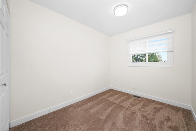 1 Fernwood Ct, Romeoville, IL 60446 - empty room featuring carpet flooring and baseboards