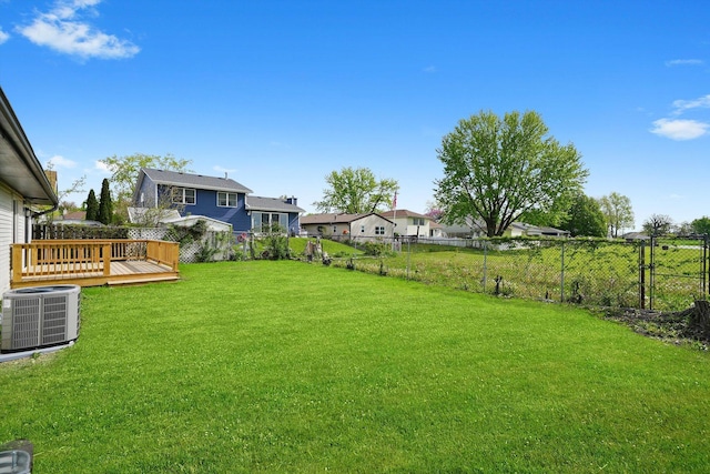 1 Fernwood Ct, Romeoville, IL 60446 - view of yard featuring central AC, a deck, and a residential view