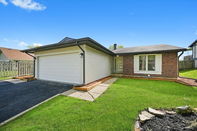 1 Fernwood Ct, Romeoville, IL 60446 - single story home featuring asphalt driveway, an attached garage, and brick siding