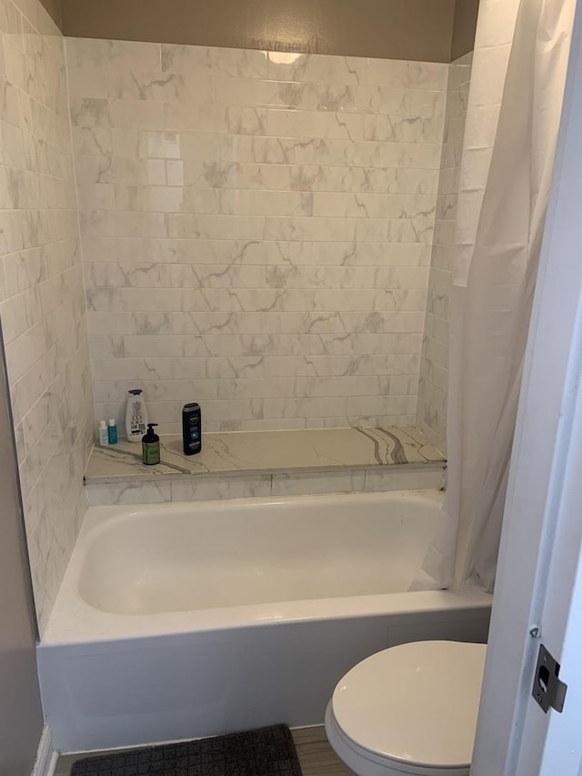 200 N Dearborn St Unit 2406, Chicago, IL 60601 - bathroom featuring shower / bath combination with curtain and toilet
