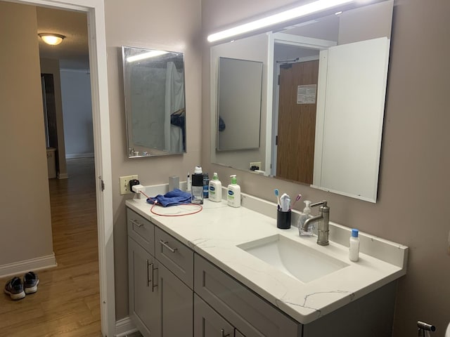 200 N Dearborn St Unit 2406, Chicago, IL 60601 - full bathroom featuring wood finished floors, vanity, and baseboards