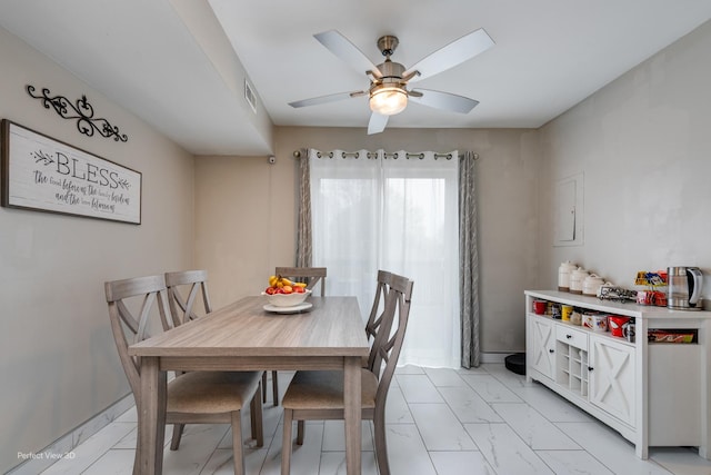 dining area with visible vents, marble finish floor, and a ceiling fan