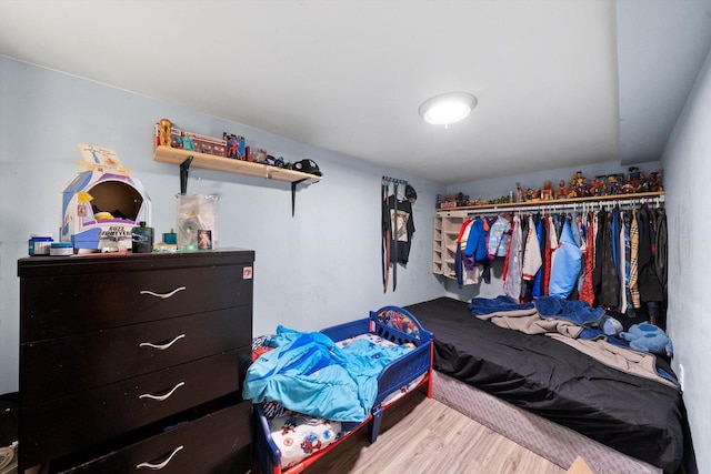 3047 S Millard Ave, Chicago, IL 60623 - walk in closet featuring wood finished floors