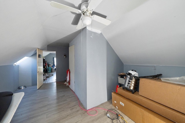 3047 S Millard Ave, Chicago, IL 60623 - additional living space with vaulted ceiling, light wood-style floors, and ceiling fan