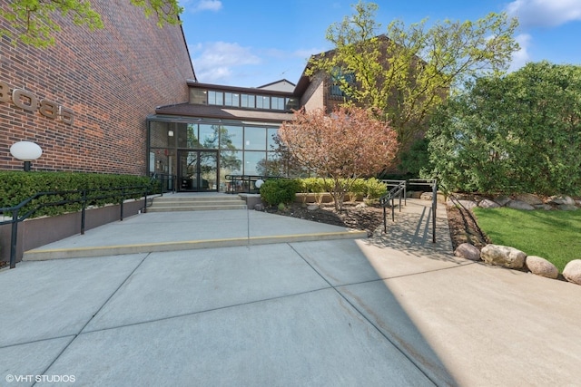 3085 Pheasant Creek Dr Unit 110, Northbrook, IL 60062 - view of exterior entry with a patio area