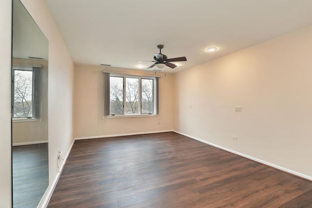 6400 N Cicero Ave Unit 511, Lincolnwood, IL 60712 - empty room with baseboards, a ceiling fan, dark wood-style flooring, and visible vents
