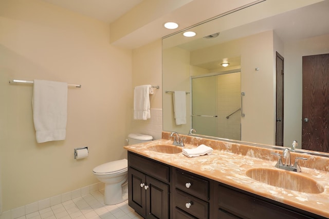 6400 N Cicero Ave Unit 511, Lincolnwood, IL 60712 - bathroom featuring tile patterned flooring, a sink, toilet, and a shower stall